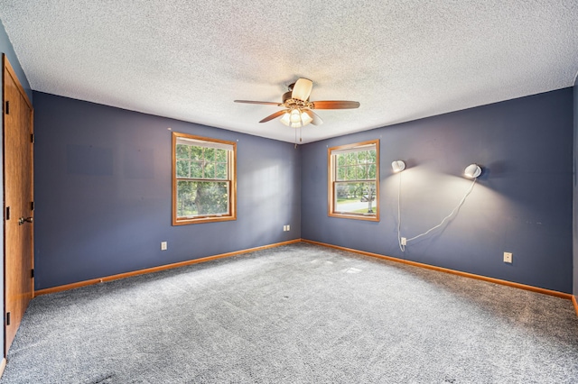 741 3rd St NE, Faribault, MN 55021 - unfurnished room featuring carpet flooring, ceiling fan, and a textured ceiling
