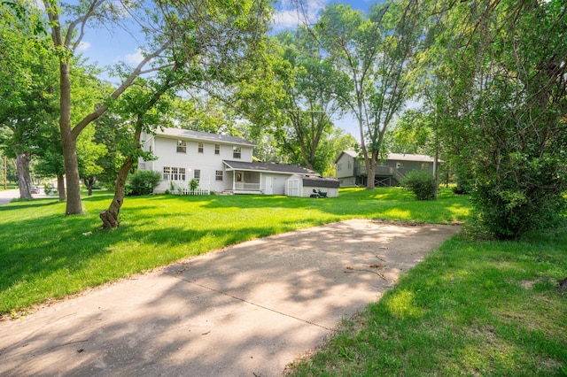 741 3rd St NE, Faribault, MN 55021 - view of green lawn with driveway