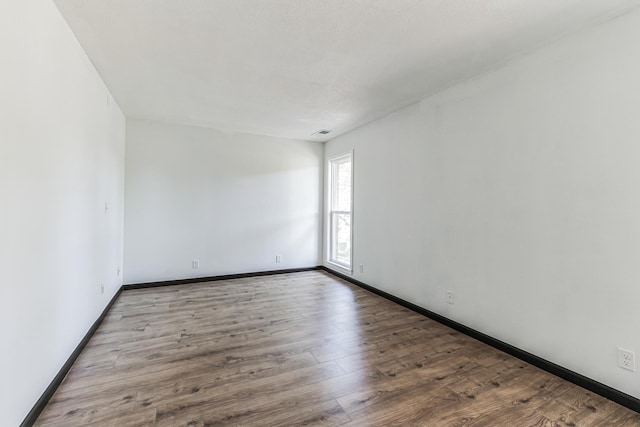 6417 Colony Way Unit 2A, Edina, MN 55435 - empty room featuring wood finished floors and baseboards