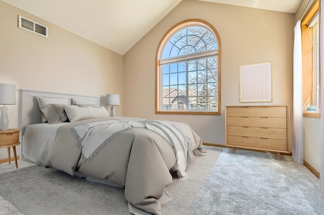 604 Crane Creek Ln, Eagan, MN 55121 - bedroom with vaulted ceiling and carpet flooring