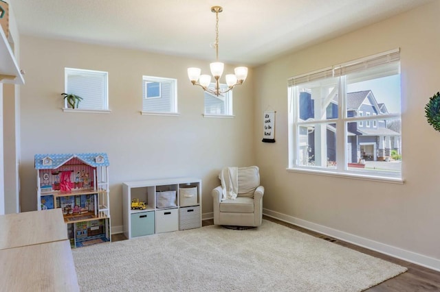 882 Redmond Dr, Carver, MN 55315 - playroom featuring a chandelier and baseboards