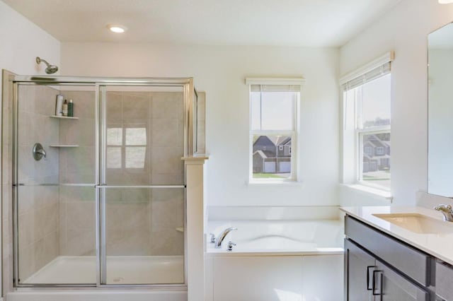 882 Redmond Dr, Carver, MN 55315 - full bathroom with vanity, a stall shower, and a bath