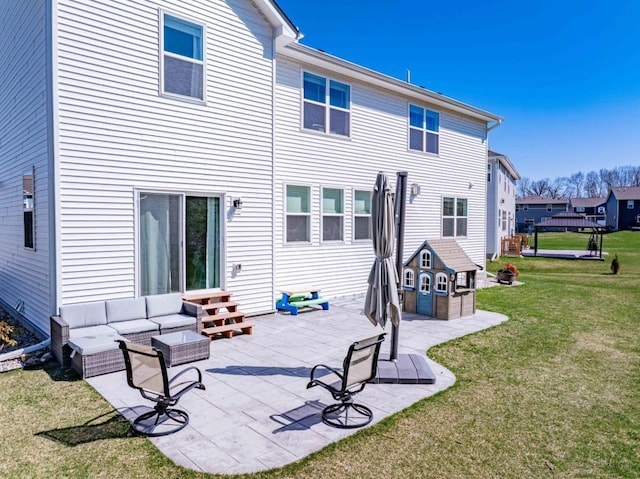 882 Redmond Dr, Carver, MN 55315 - rear view of property with a yard, a patio, entry steps, and an outdoor living space