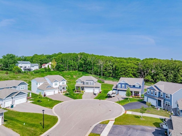 882 Redmond Dr, Carver, MN 55315 - aerial perspective of suburban area featuring a heavily wooded area