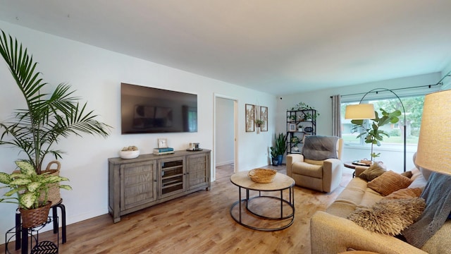 401 5th St NE, Barnesville, MN 56514 - living area featuring light wood-style floors and baseboards