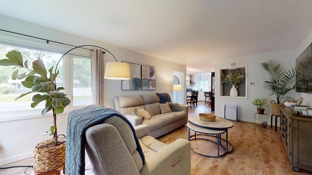 401 5th St NE, Barnesville, MN 56514 - living room with light wood-style floors and baseboards