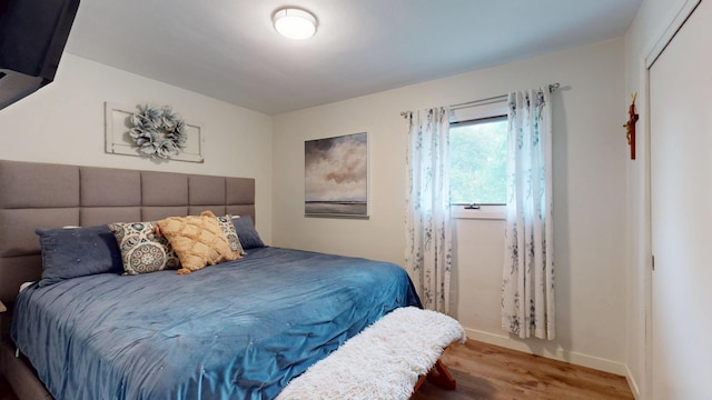 401 5th St NE, Barnesville, MN 56514 - bedroom featuring wood finished floors and baseboards