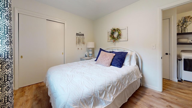401 5th St NE, Barnesville, MN 56514 - bedroom with wood finished floors, a closet, and baseboards