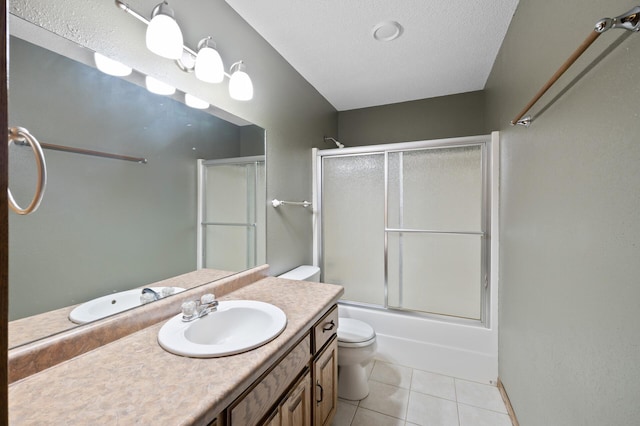30170 Norway Dr NW, Bradford Twp, MN 55008 - full bathroom featuring vanity, tile patterned floors, shower / bath combination with glass door, and a textured ceiling