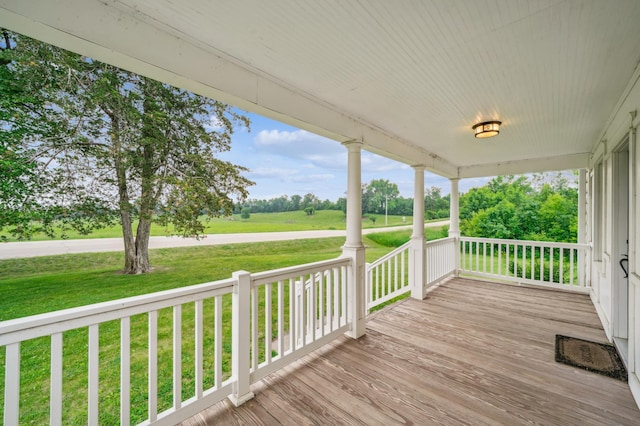 18160 Echo Ave, Faribault, MN 55021 - wooden porch featuring a yard and view of scattered trees