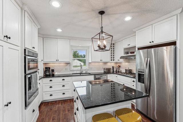 18160 Echo Ave, Faribault, MN 55021 - kitchen with stainless steel appliances, recessed lighting, decorative backsplash, open shelves, and white cabinets