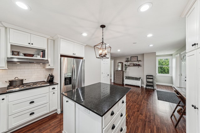 18160 Echo Ave, Faribault, MN 55021 - kitchen with appliances with stainless steel finishes, dark wood finished floors, tasteful backsplash, recessed lighting, and a center island
