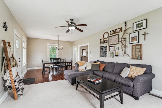 18160 Echo Ave, Faribault, MN 55021 - living room featuring ceiling fan, a chandelier, and wood finished floors