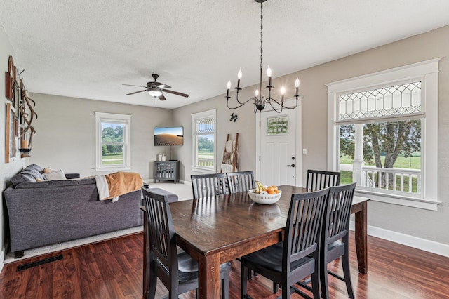 18160 Echo Ave, Faribault, MN 55021 - dining area with dark wood-style floors, ceiling fan, a textured ceiling, and a chandelier