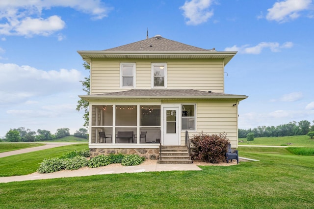 18160 Echo Ave, Faribault, MN 55021 - back of house with a sunroom, a lawn, a shingled roof, and entry steps