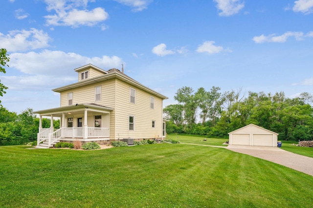 18160 Echo Ave, Faribault, MN 55021 - view of side of home featuring a porch, an outdoor structure, a garage, a lawn, and view of scattered trees