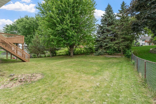 14441 Alabama Ave S, Savage, MN 55378 - view of yard featuring stairs and a wooden deck