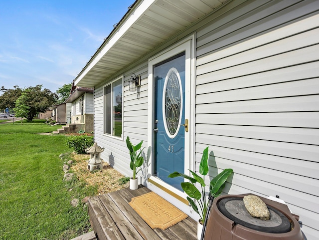 45 Oak Ave S, Maple Lake, MN 55358 - property entrance with a lawn