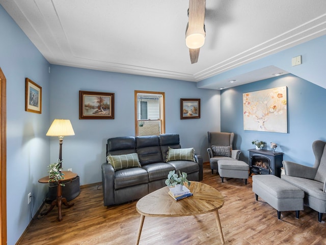 45 Oak Ave S, Maple Lake, MN 55358 - living room featuring wood finished floors and a wood stove