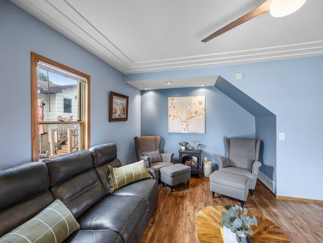 45 Oak Ave S, Maple Lake, MN 55358 - living room featuring wood finished floors and a wood stove