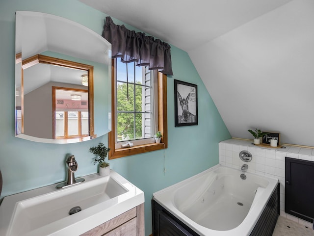 45 Oak Ave S, Maple Lake, MN 55358 - bathroom with vaulted ceiling, a whirlpool tub, and vanity