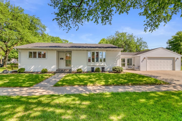 1204 20th Ave S, Moorhead, MN 56560 - single story home with a front lawn, concrete driveway, and an attached garage