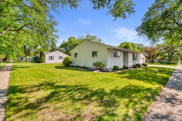 1204 20th Ave S, Moorhead, MN 56560 - view of side of property featuring a lawn