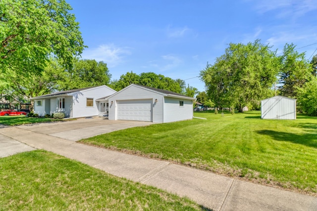 1204 20th Ave S, Moorhead, MN 56560 - view of front of home featuring a front yard and an outdoor structure