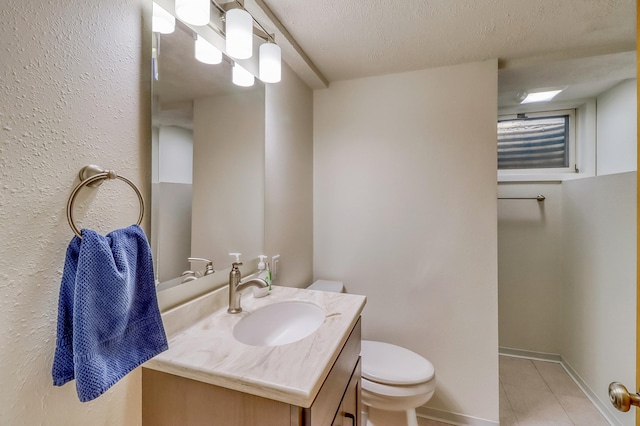 1204 20th Ave S, Moorhead, MN 56560 - bathroom with vanity, tile patterned flooring, and a textured ceiling