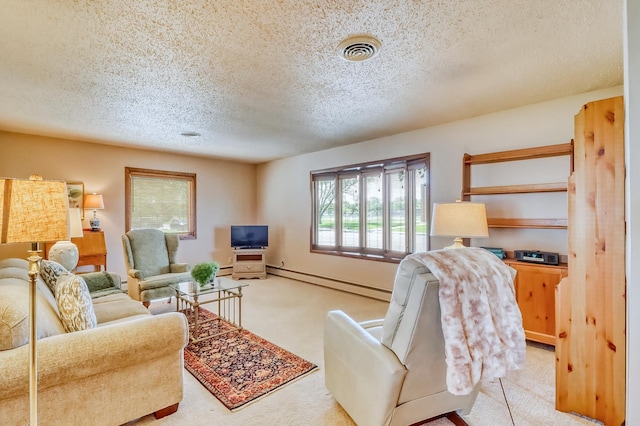 1204 20th Ave S, Moorhead, MN 56560 - living room featuring a baseboard heating unit, a textured ceiling, light colored carpet, and a baseboard radiator