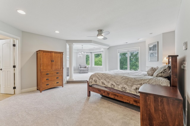3287 Norcrest Ave N, Baytown Twp, MN 55082 - bedroom with light carpet, ornate columns, recessed lighting, a chandelier, and a ceiling fan