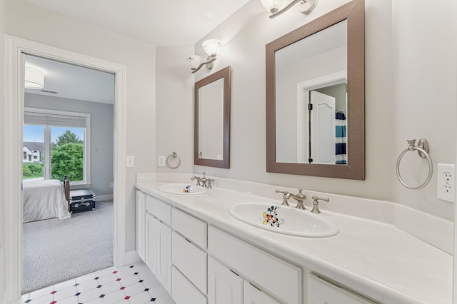 3287 Norcrest Ave N, Baytown Twp, MN 55082 - bathroom with double vanity, ensuite bath, and tile patterned floors
