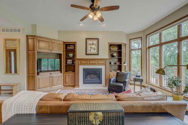 1994 80th St, Somerset, WI 54025 - living area with a tiled fireplace, ceiling fan, and recessed lighting