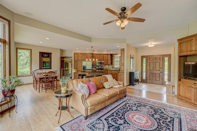 1994 80th St, Somerset, WI 54025 - living room with light wood finished floors, ceiling fan, baseboards, and recessed lighting