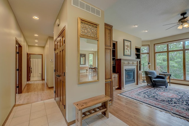 1994 80th St, Somerset, WI 54025 - hallway with recessed lighting, light tile patterned floors, and baseboards
