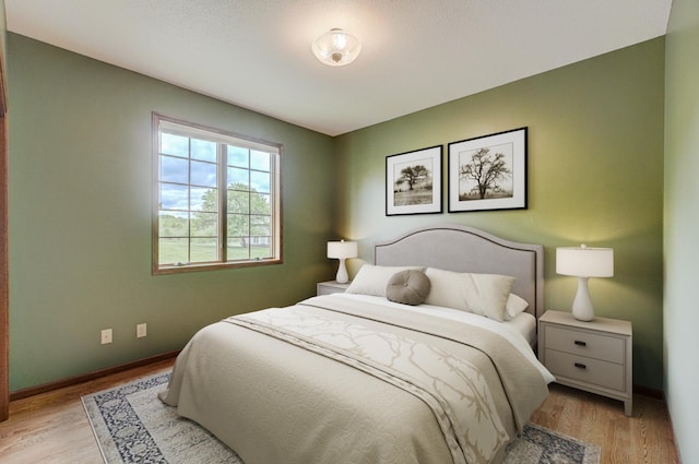 1994 80th St, Somerset, WI 54025 - bedroom featuring baseboards and light wood-style floors