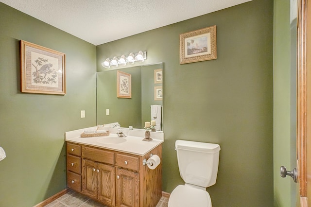 1994 80th St, Somerset, WI 54025 - bathroom with toilet, vanity, and baseboards