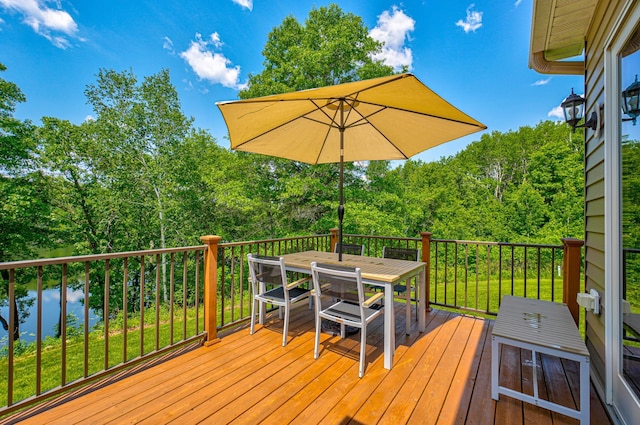 1994 80th St, Somerset, WI 54025 - wooden terrace featuring outdoor dining area and a water view