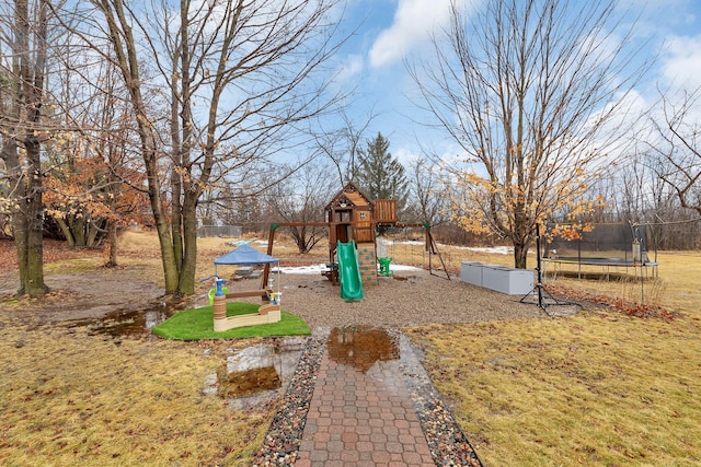 30667 Melanie Way, Collegeville Twp, MN 56374 - view of jungle gym with a trampoline and a lawn