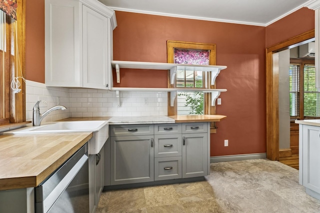 228 Sidney St W, Saint Paul, MN 55107 - kitchen featuring open shelves, gray cabinetry, backsplash, stone finish flooring, and crown molding