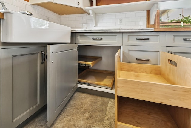 228 Sidney St W, Saint Paul, MN 55107 - kitchen view of decorative backsplash and gray cabinetry