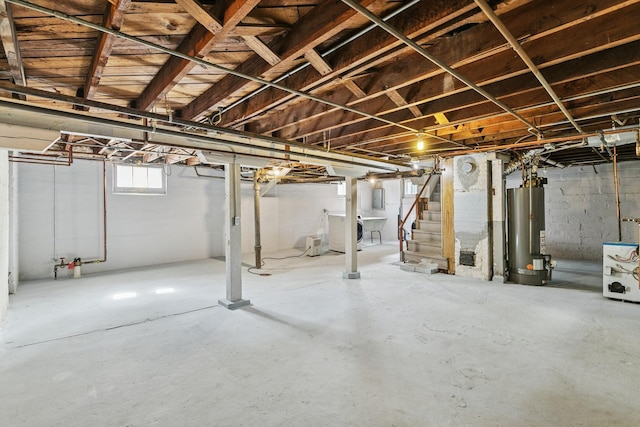 228 Sidney St W, Saint Paul, MN 55107 - basement featuring water heater, washer / clothes dryer, stairway, and electric panel