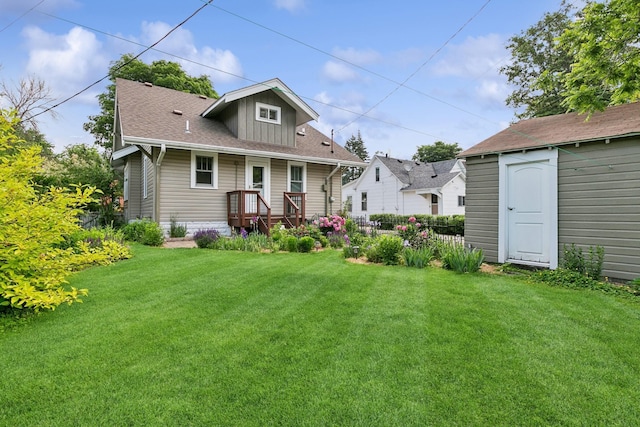 228 Sidney St W, Saint Paul, MN 55107 - rear view of property featuring an outdoor structure