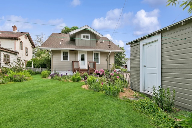 228 Sidney St W, Saint Paul, MN 55107 - back of house with roof with shingles