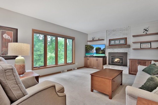 6033 Sargent Ct N, Lino Lakes, MN 55110 - living room with light carpet, a brick fireplace, and baseboards