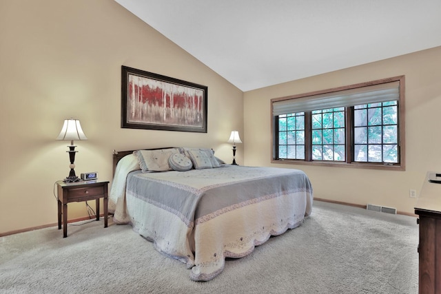 6033 Sargent Ct N, Lino Lakes, MN 55110 - carpeted bedroom featuring baseboards and vaulted ceiling