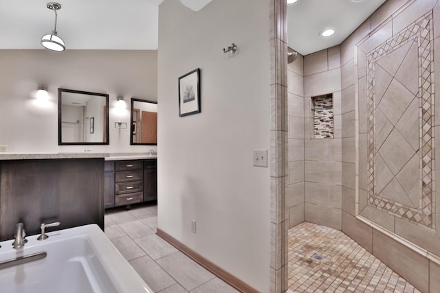 6033 Sargent Ct N, Lino Lakes, MN 55110 - full bathroom featuring tile patterned floors, a shower stall, double vanity, and baseboards