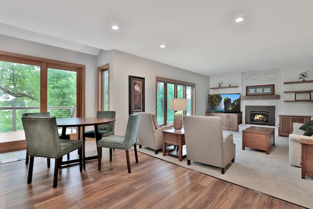 6033 Sargent Ct N, Lino Lakes, MN 55110 - dining room featuring recessed lighting, light wood finished floors, and a fireplace