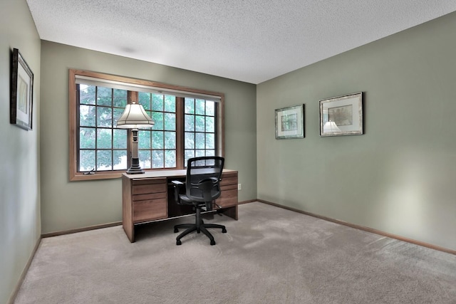 6033 Sargent Ct N, Lino Lakes, MN 55110 - office area with light colored carpet, a textured ceiling, and baseboards
