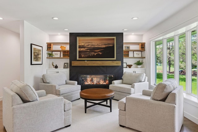 3930 Cottage Ln, Minnetonka, MN 55305 - living room featuring healthy amount of natural light, a fireplace, and recessed lighting